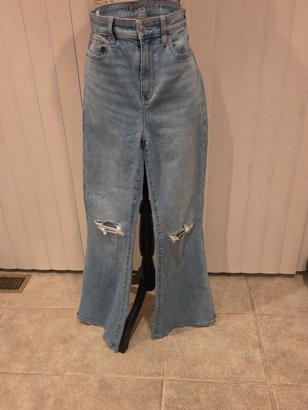 American Eagle Outfitters Light Blue High-Rise Distressed Flare Jeans